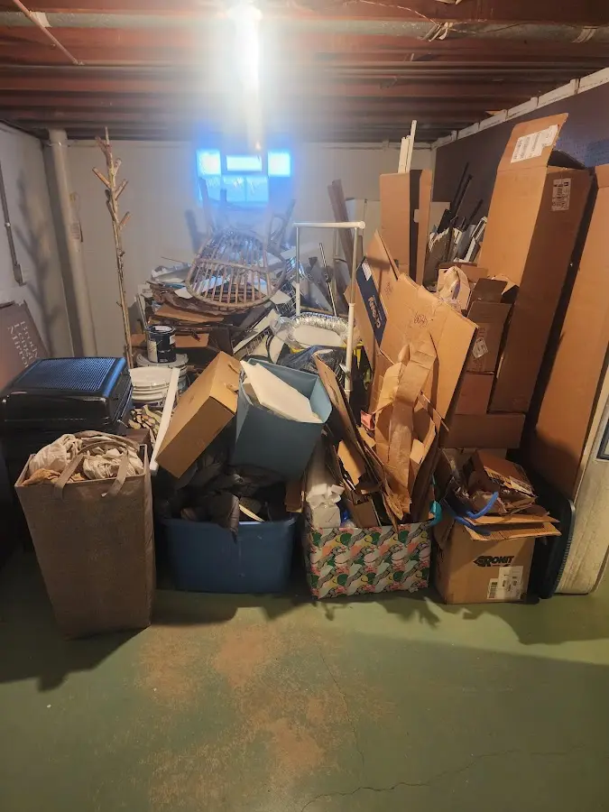 Roll-off dumpster container at job site for 15 Yard Dumpster Rental in Gray